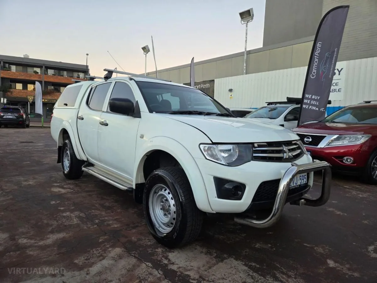 2015 Mitsubishi Triton — photo 1